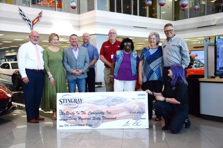 Stingray Chevrolet presents new car, recordbreaking donation following